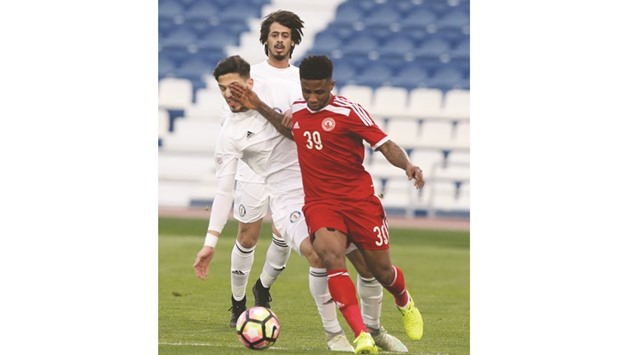 Action from the match between Al Khor (in white) and Al Arabi (in red) yesterday. (Othman Iraqi)
