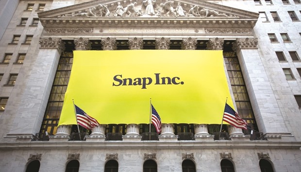Snap signage is displayed in front of the New York Stock Exchange during the companyu2019s initial public offering on March 2. Snap raised $3.4bn in the first US technology listing this year.