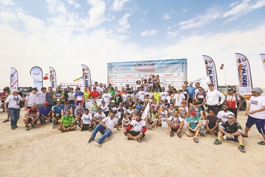 Winners of the Al Adaid Desert Challenge during the podium ceremony on Friday. (Getty Images / www.aladaid.qa)