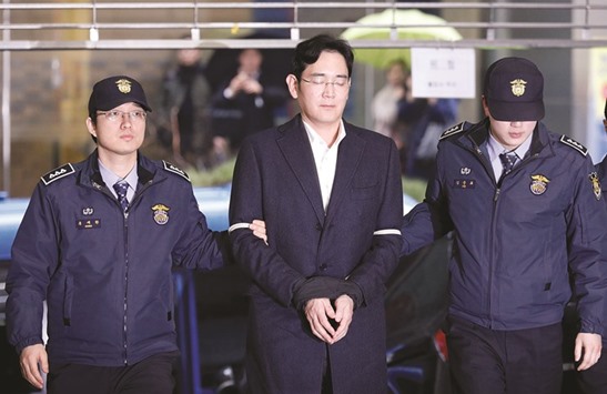 Samsung Group chief, Jay Y Lee, arrives at the office of the independent counsel team in Seoul (file). South Koreau2019s special prosecutor accused Lee and other company  executives of conspiring to create fake documents to mask millions of dollars in bribes funnelled to a confidante of the nationu2019s president.