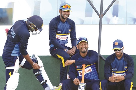 Sri Lankau2019s players share a light moment during a practice session in Galle, the eve of the first Test against Bangladesh. (AFP)
