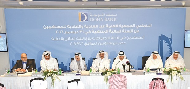 Sheikh Fahad with Doha Bank directors at the annual meeting in the presence of other dignitaries.