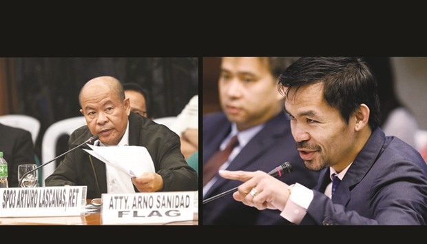 Retired police officer Arturo u201cArthuru201d Lascanas holds some documents as he testifies at a Senate hearing in Manila yesterday.  RIGHT: Senator and boxer Manny Pacquiao questions retired policeman Arturo Lascanas during a Senate inquiry on alleged extra-judicial killings, in Manila yesterday.