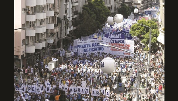 Teachers march during a 48-hour nationwide strike demanding pay rises, in Buenos Aires yesterday