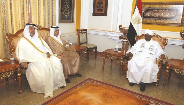 HE Ahmed bin Abdullah bin Zaid al-Mahmoud with Sudanese President Omar Hassan al-Bashir during a meeting in Khartoum yesterday.