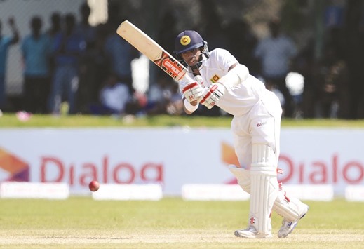 Sri Lankan cricketer Kusal Mendis plays a shot yesterday.
