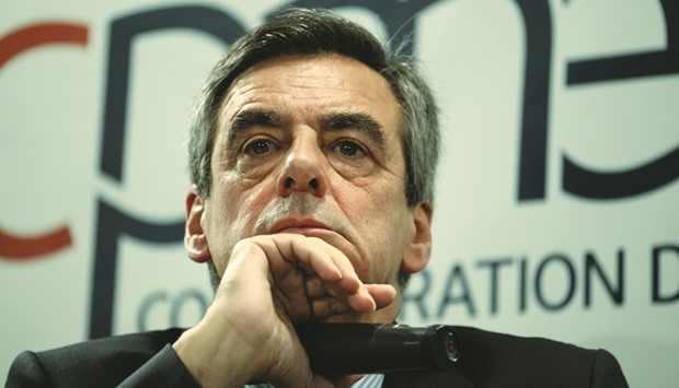 French presidential election candidate for the right-wing Les Republicains (LR) party Francois Fillon listens during a debate at the French Confederation of Small and Medium-Sized Enterprises (CPME) unionu2019s headquarters in Puteaux, west of Paris, on Monday.