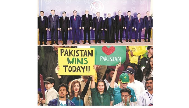 TWIN BOOST: Leaders and representatives of the ECO member states pose for a family portrait with Prime Minister Nawaz Sharif, centre, in Islamabad; below, Pakistani fans make a statement during the PSL final in Lahore.