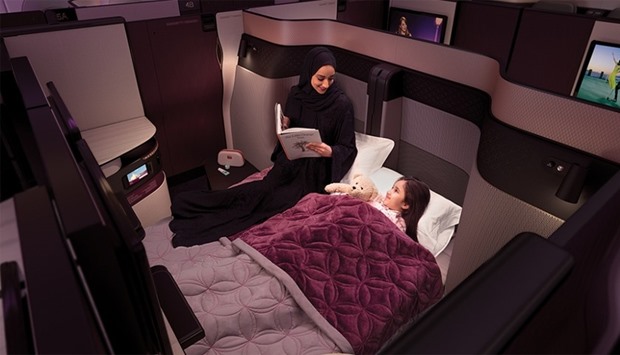 QSuite features the industryu2019s first-ever double bed available in business class, with privacy panels that stow away, allowing passengers in adjoining seats to create their own private room.