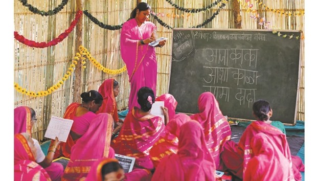 Sheetal Prakash More, a 30-year-old teacher, teaches at Aajibaichi Shaala in Fangane village.