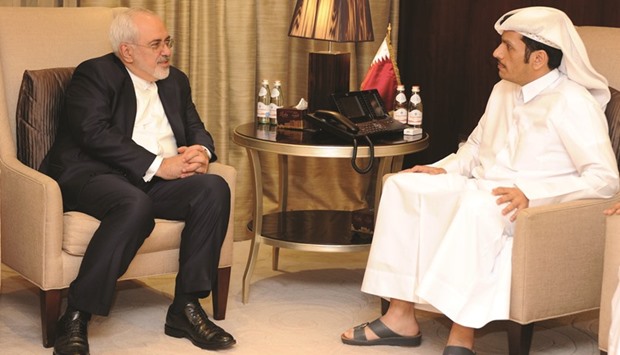 HE the Foreign Minister Sheikh Mohamed bin Abdulrahman al-Thani, right, holds talks with Iranu2019s Foreign Minister Mohammad-Javad Zarif yesterday.