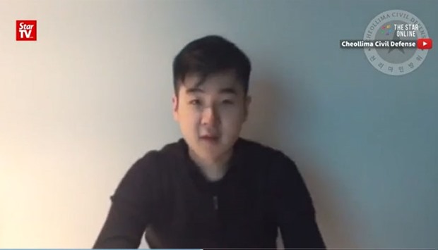 In the video, the man says in English: ,My name is Kim Han-Sol, from North Korea, part of the Kim family.