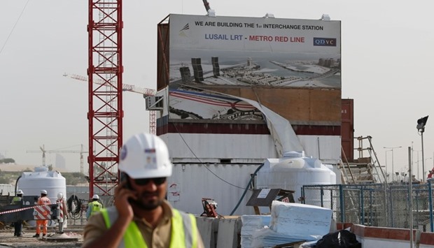 A worker of QDVC (Qatari Diar/VINCI Construction Grands Projets), the Qatari branch of French construction giant Vinci, walking at the construction site of a new metro line in the capital Doha. File picture:  March 24, 2015