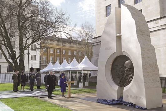 Queen Elizabeth II and Prince Philip at the unveiling of the Iraq and Afghanistan memorial at Victoria Embankment Gardens in central London.