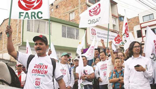 Members of the Farc campaign before legislative elections in Fusagasuga, Colombia.