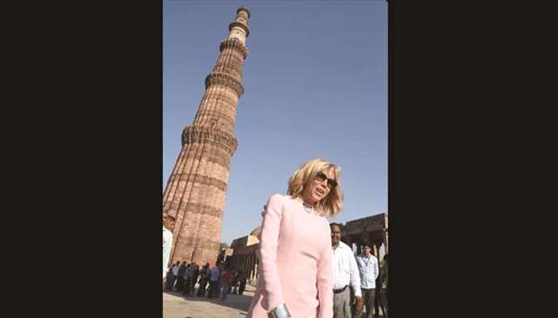 Brigitte Macron, wife of French President Emmanuel Macron, poses during her visit at the Qutub Minar in New Delhi yesterday.
