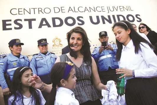 US ambassador to the UN Nikki Haley interacting with children at a school in Tegucigalpa, Honduras.