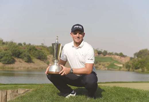 Matt Wallace of England poses with the trophy after winning the Hero Indian Open 2018 golf tournament at DLF Golf and Country Club in Gurugram, New Delhi, yesterday. (AFP)