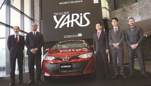 Toyota and AAB officials with the new Yaris at the AABu2019s main Toyota showroom.