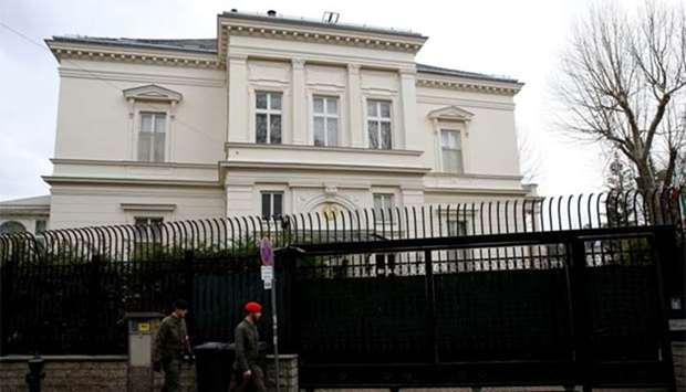 Members of the Austrian armed forces walk past the Iranian ambassador's residence in Vienna on Monday.