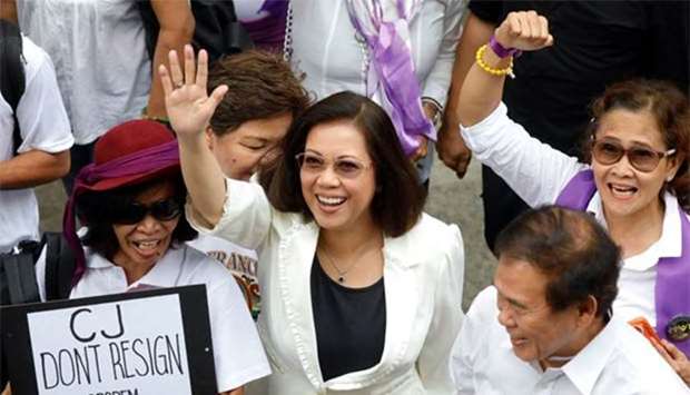 Philippine Supreme Court Chief Justice Maria Lourdes Sereno waves to supporters during a gathering of the Coalition For Justice at the University of the Philippines, in Manila on Monday.