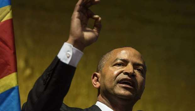 Congolese opponent in exile, one of the main opponents of the Congolese president, Moise Katumbi gestures as he delivers a speech during the launch of his political movement ,Together for Change, on March 12, 2018 at the Misty Hills Country Hotel, Muldersdrift Estate, in Johannesburg