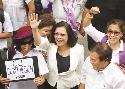 Supreme Court Chief Justice Maria Lourdes Sereno waves to supporters during a gathering of the Coalition For Justice at the University of the Philippines, Diliman, Quezon City, Metro Manila, yesterday.