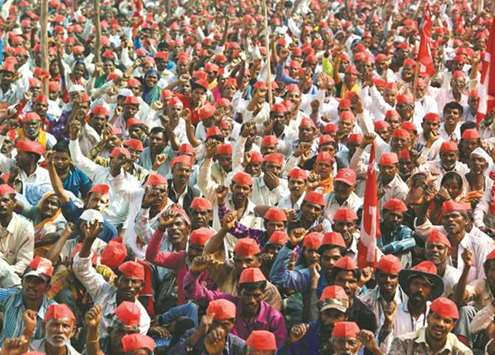 Farmers shout slogans as they listen to speakers at the site of a protest rally in Mumbai yesterday.