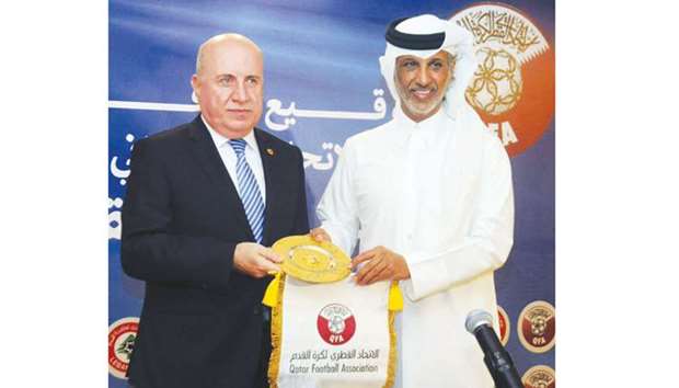 President of the Qatar Football Association Sheikh Hamad bin Khalifa bin Ahmed al-Thani (right) with Lebanonu2019s Football Association chief Hashem Haidar in Beirut.