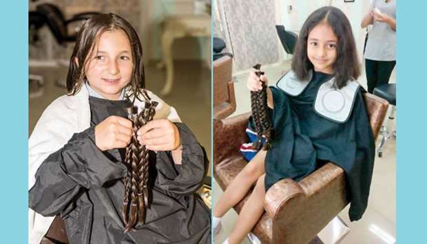 Lara, Class-V student, shows her braids and Naisha, Class-II student, is seen after haircut.