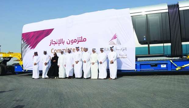 Officials mark the arrival of the first Lusail tram at Hamad Port.