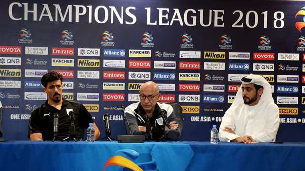 Al Sadd coach Jesualdo Ferreira and forward Baghdad Bouendjah speak to the media yesterday.