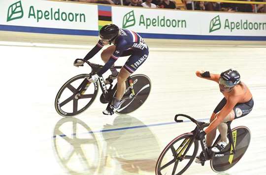 Netherlandu2019s Laurine van Riessen (right) celebrates after beating Franceu2019s Mathilde Gros in the womenu2019s Sprint during the UCI Track Cycling World Championships. (AFP)