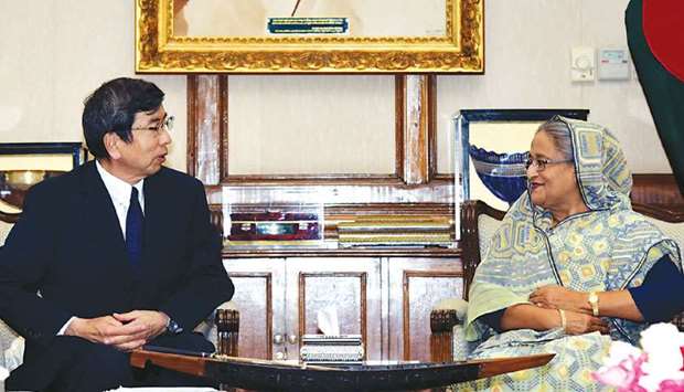 Visiting Asian Development Bank President Takehiko Nakao exchanging views with Prime Minister Sheikh Hasina in Dhaka.
