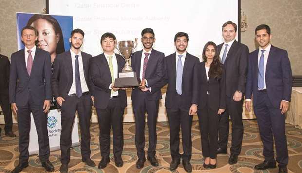CMU-Q students pose after winning the inaugural CFA Institute Research Challenge.