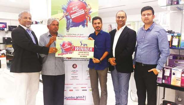 Jumbo Electronics officials at the first draw on March 11.