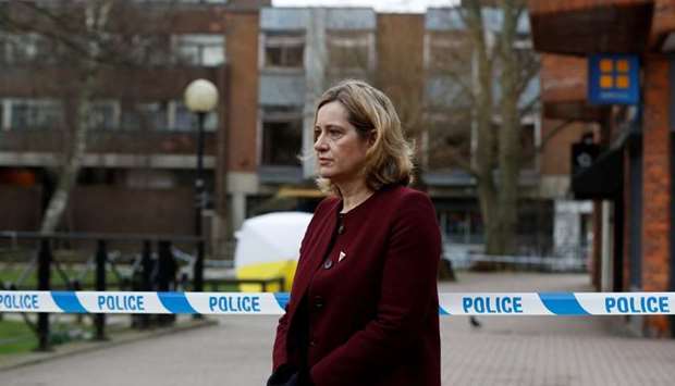 Britain's Home Secretary Amber Rudd, accompanied by Temporary Chief Constable Kier Pritchard, visits the scene where Sergei Skripal and his daughter Yulia were found after having been poisoned by a nerve agent in Salisbury, Britain.