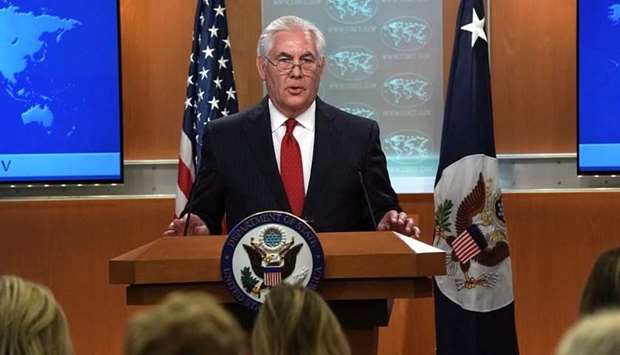 Outgoing US Secretary of State Rex Tillerson makes a statement on his departure from the State Department at the State Department in Washington, DC.