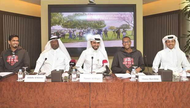 Mutaz Barshim (second right) and Amad al-Hosni (left) with senior officials of AZF and Diverse at the press conference yesterday. PICTURE: Noushad Thekkayil