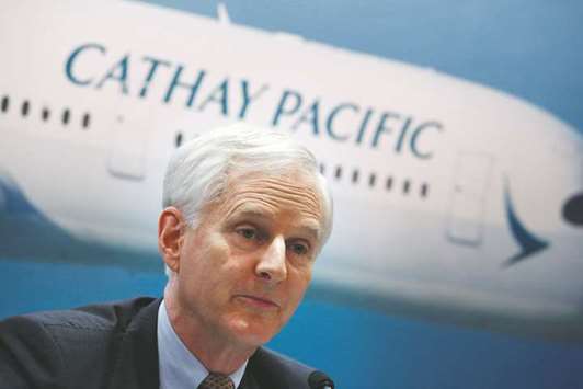 Cathay Pacific Group chairman John Slosar attends a news conference on the  carrieru2019s annual results in Hong Kong. The airline yesterday booked the first back-to-back annual loss in its seven-decade history but said it was in the black for the second half and was upbeat about the next year.