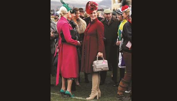 Zara Tindall attends the Ladies Day at the Cheltenham Festival yesterday. The Queenu2019s pregnant grand-daughter, who is due three months after Catherine, the Duchess of Cambridge, appeared in good spirits for her second day at the renowned racing event.