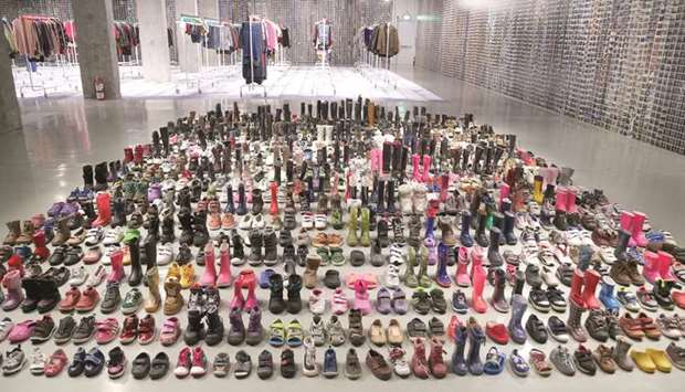 Laundromat exhibition features meticulously arranged shoes and thousands of clothing items, as well as 17,062 pictures relating to refugees. PICTURES: Jayan Orma