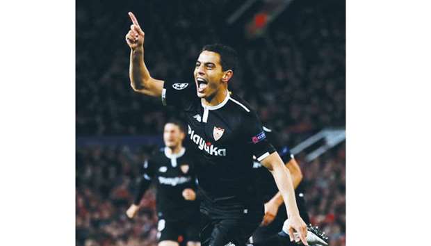 Sevillau2019s Wissam Ben Yedder celebrates scoring a goal against Manchester United during their Champions League match. (Reuters)