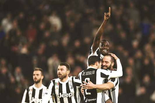 Juventusu2019 French midfielder Blaise Matuidi celebrates with teammates after scoring a goal during the Serie A match against Atalanta at the Allianz Stadium in Turin. (AFP)