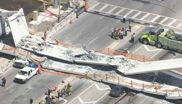 Several fatalities and vehicles crushed after the collapse of a pedestrian bridge in Florida