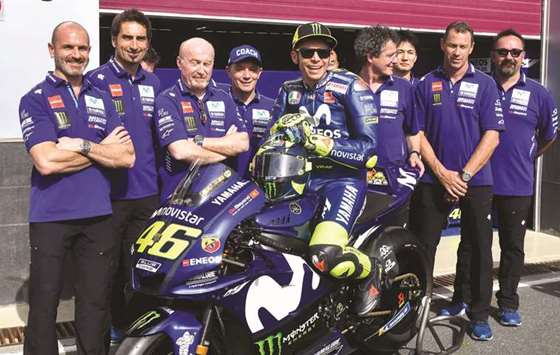 Rossi with his Yamaha team members. PICTURE: Noushad Thekkayil