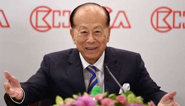 Li Ka-shing, 89, gestures during a press conference in Hong Kong on Friday.