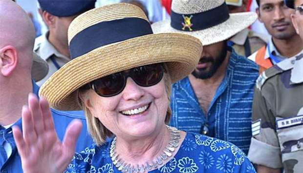 Former US secretary of state Hillary Clinton waves as she arrives in Jodhpur earlier this week.