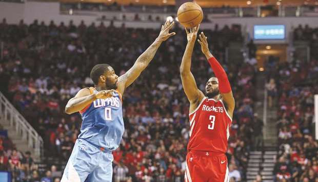 Houston Rockets guard Chris Paul (3) shoots the ball as LA Clippers guard Sindarius Thornwell defends during the second quarter of their NBA game at Toyota Centre in Houston. PICTURE: USA TODAY Sports