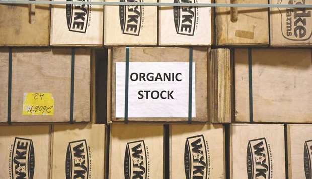 A label reading u2018Organic Stocku2019 is seen on boxes of organic cheddar cheese at Wyke Farms Ltdu2019s storage unit in Wincanton, UK. The cheese is made with organic milk from cows that graze on the lush hills of Somerset, free of genetically-modified food and routine treatments with antibiotics. Itu2019s unclear whether these organic standards will still be recognised by the European Union and even the US once Britain leaves the trade bloc.